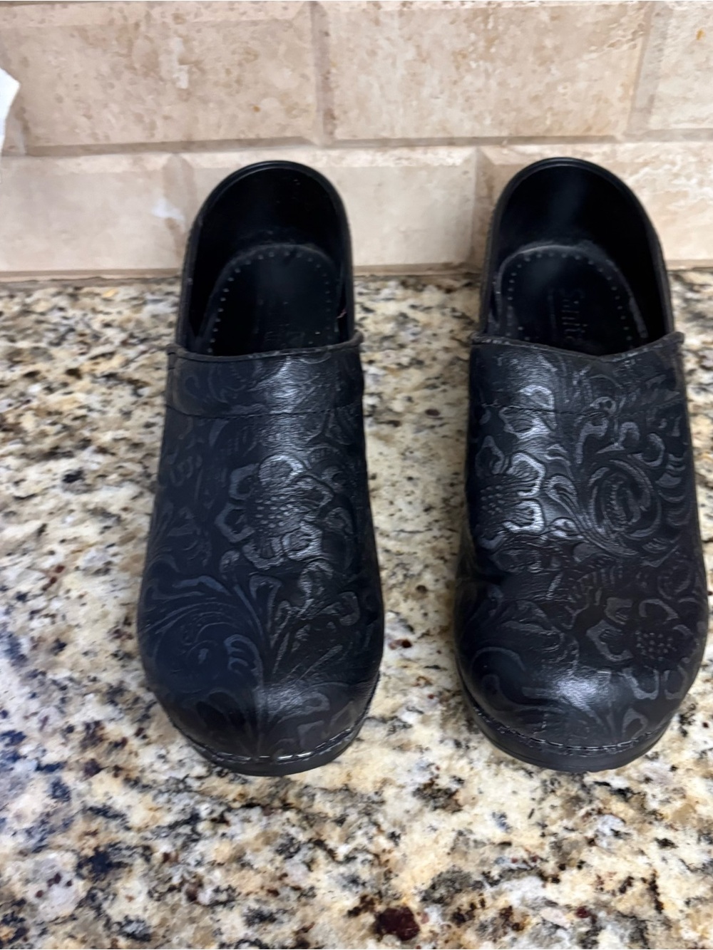 Sanita Black Floral-Textured Slip-On Clogs